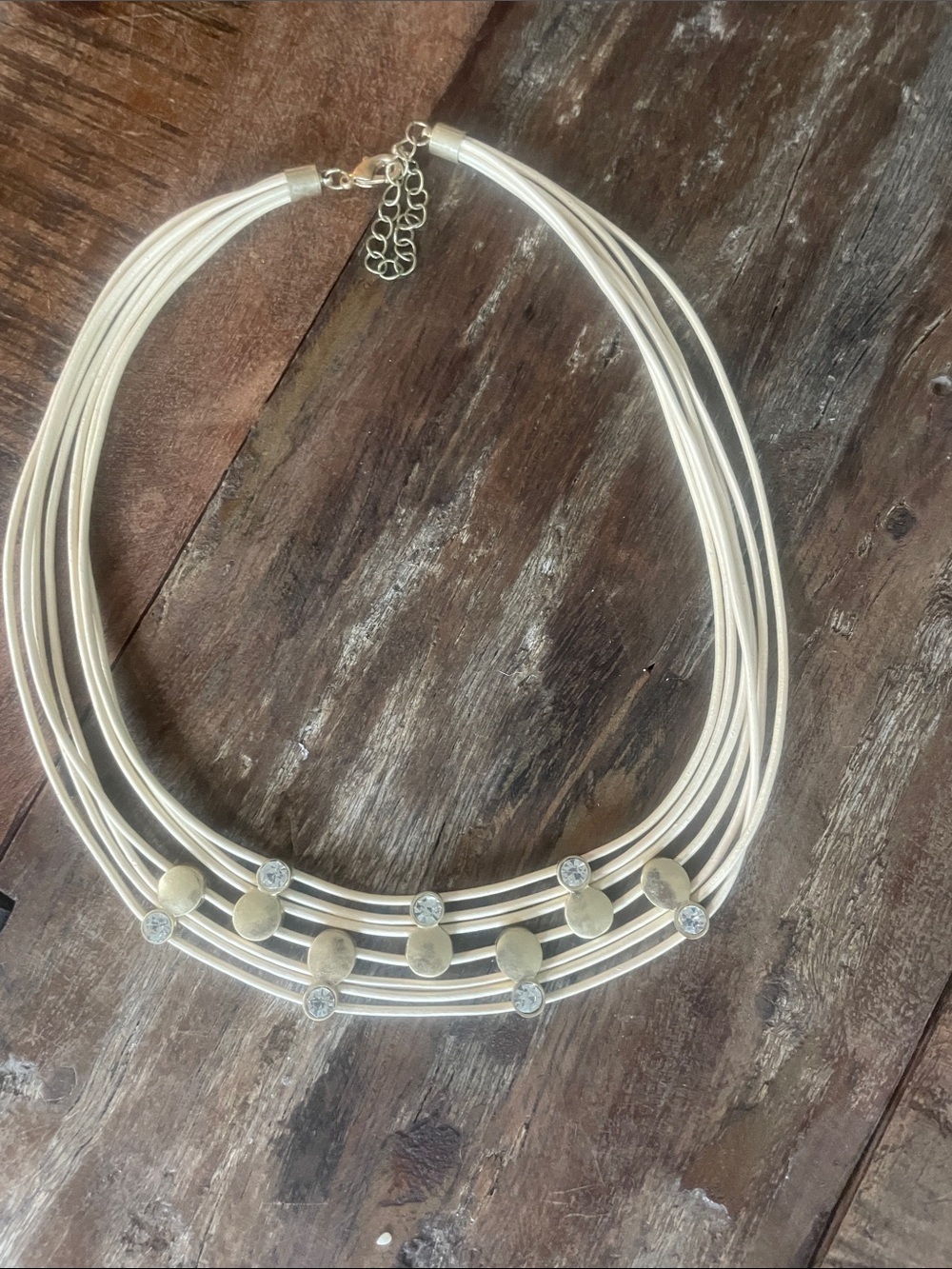 Cream Multi-Strand Necklace with Gold Accents and Crystal Details